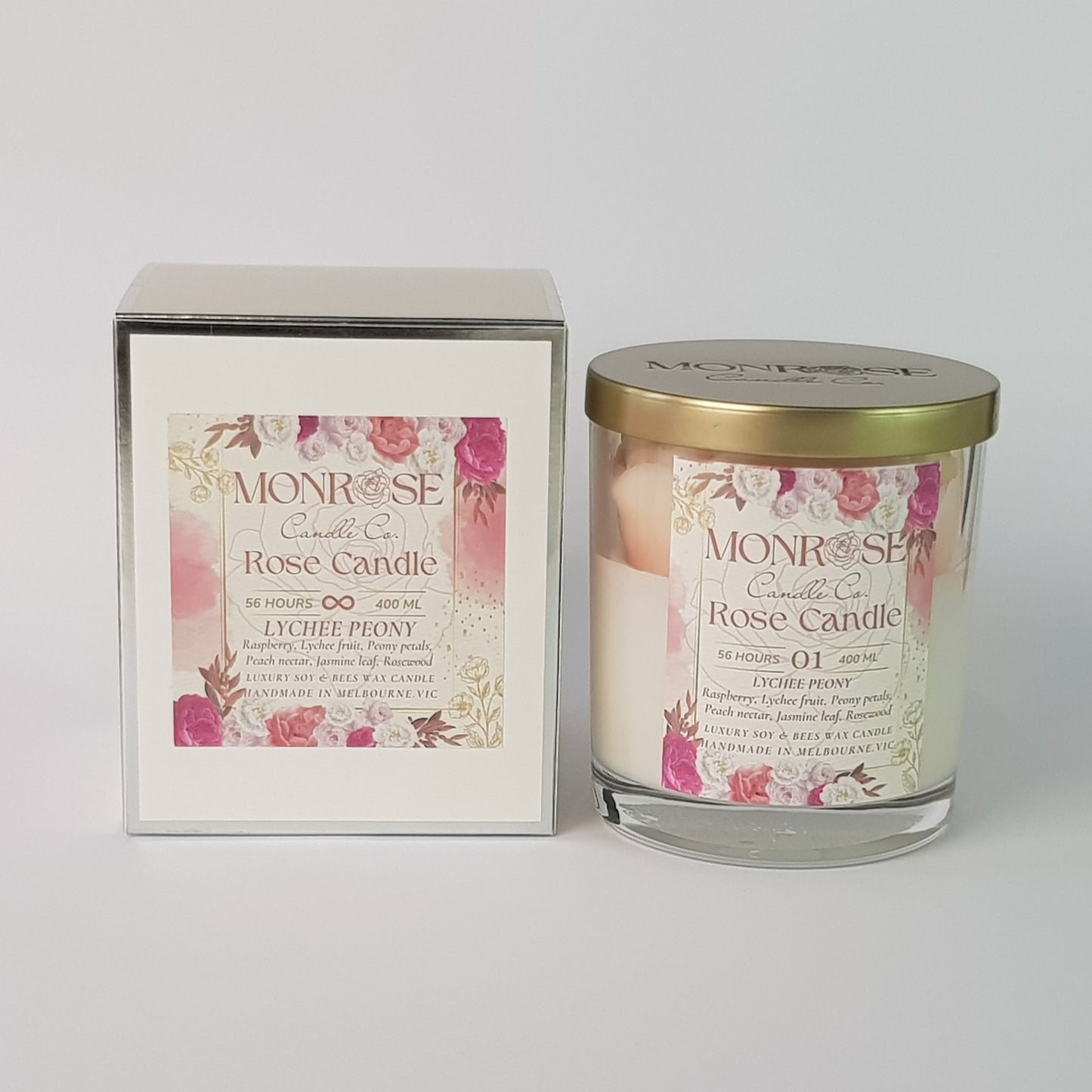 Front view of a rose candle in a clear jar with "Lychee Peony" fragrance and a cotton wick as number 01, containing 365 grams of bees & soy wax and offering 56 hours of burn time.