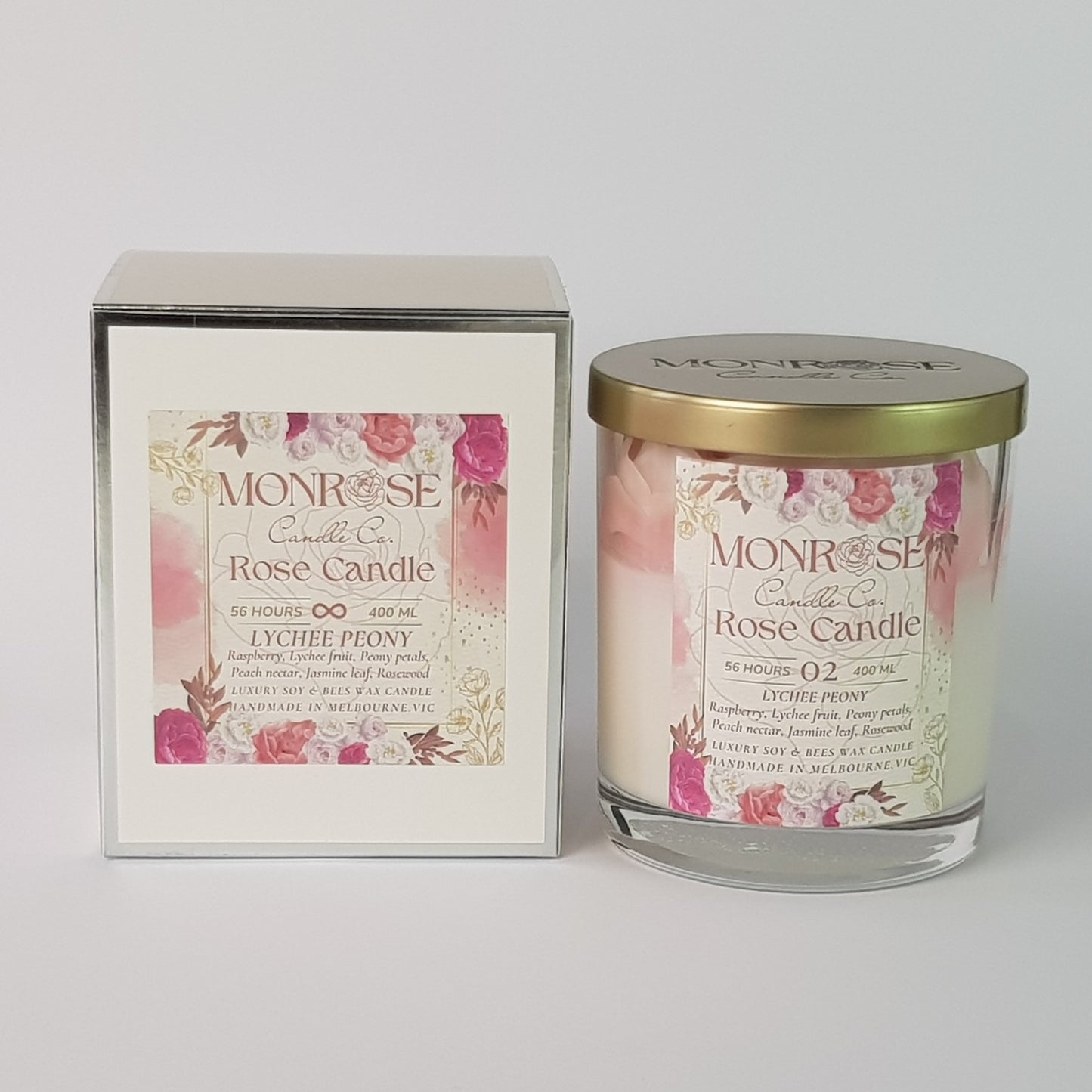 Front view of a rose candle in a clear jar with "Lychee Peony" fragrance and a cotton wick as number 02, containing 365 grams of bees & soy wax and offering 56 hours of burn time.