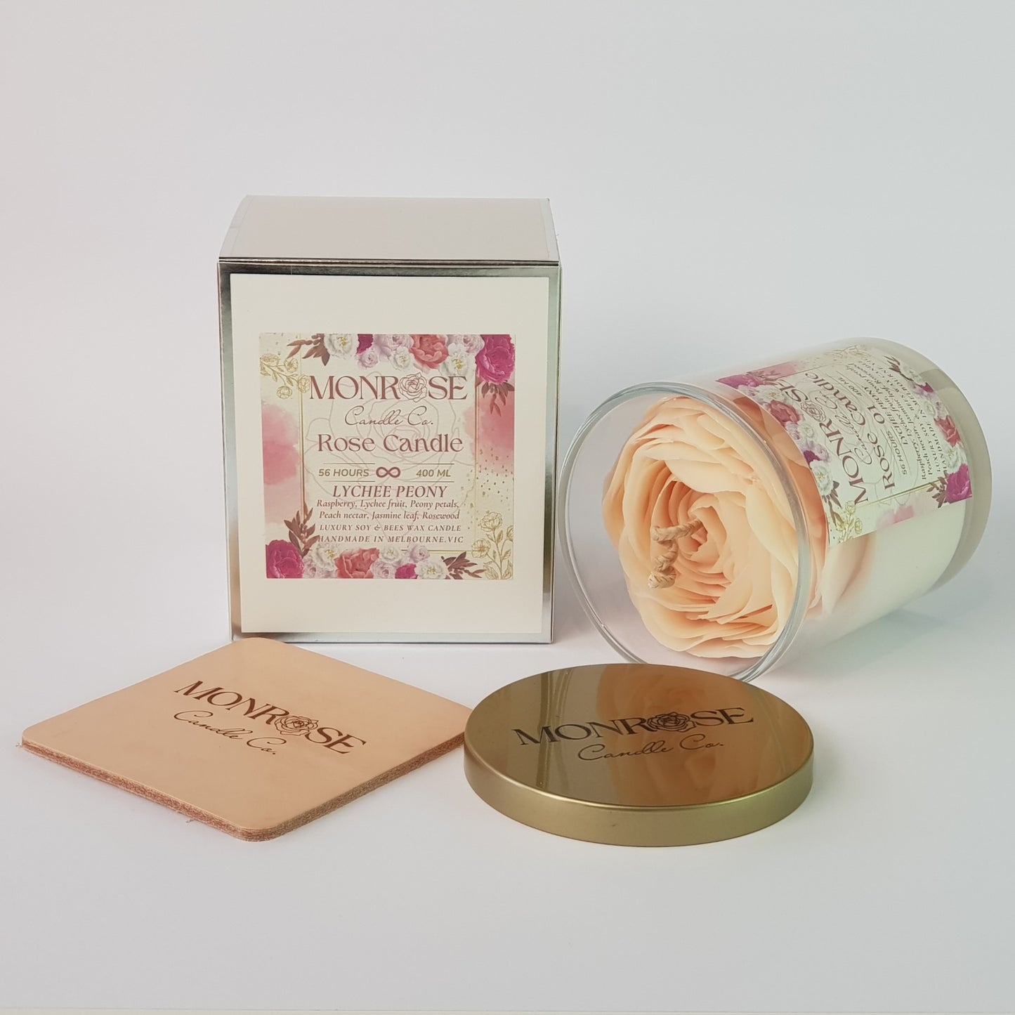 Side view of a Rose Candle No.1 in a clear jar with "Lychee Peony" fragrance and a cotton wick, containing 365 grams of bees & soy wax and offering 56 hours of burn time.