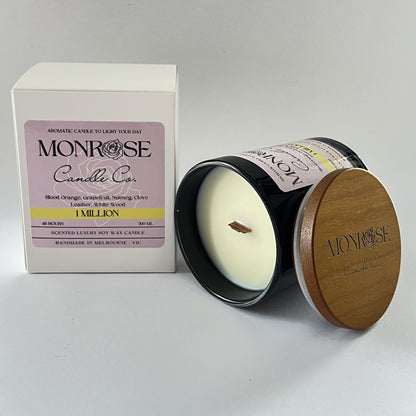 "Side view of a black jar candle with 1 million fragrance and wood wick, containing 265 grams of soy wax and offering 48 hours of burn time."