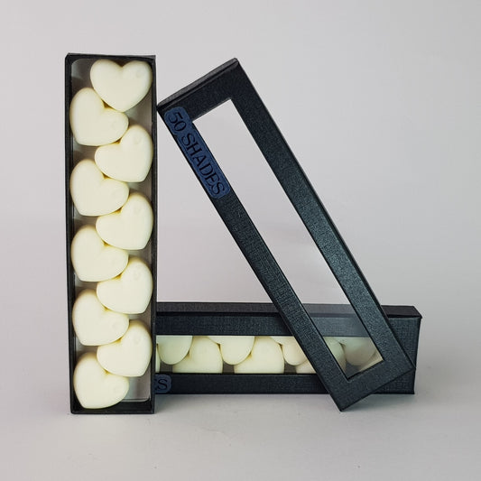 "This is the front view of heart shaped soy wax melts, featuring 10 solid wax melts inside a rectangular box. The fragrance of the wax melt is "50 shades" and it contains 76 grams of soy wax and it is hand crafted in Melbourne, Australia."