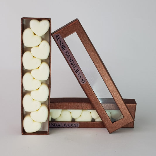 This is the front view of heart shaped soy wax melts, featuring 10 solid wax melts inside a rectangular box. The fragrance of the wax melt is  "Australian sandalwood" and it contains 76 grams of soy wax and it is hand crafted in Melbourne, Australia.