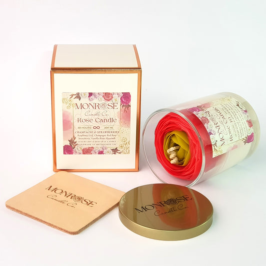 Side view of a Rose Candle No.10 in a clear jar with "Champagne and strawberries" fragrance and cotton wick, containing 250 grams of soy wax and offering 48 hours of burn time.