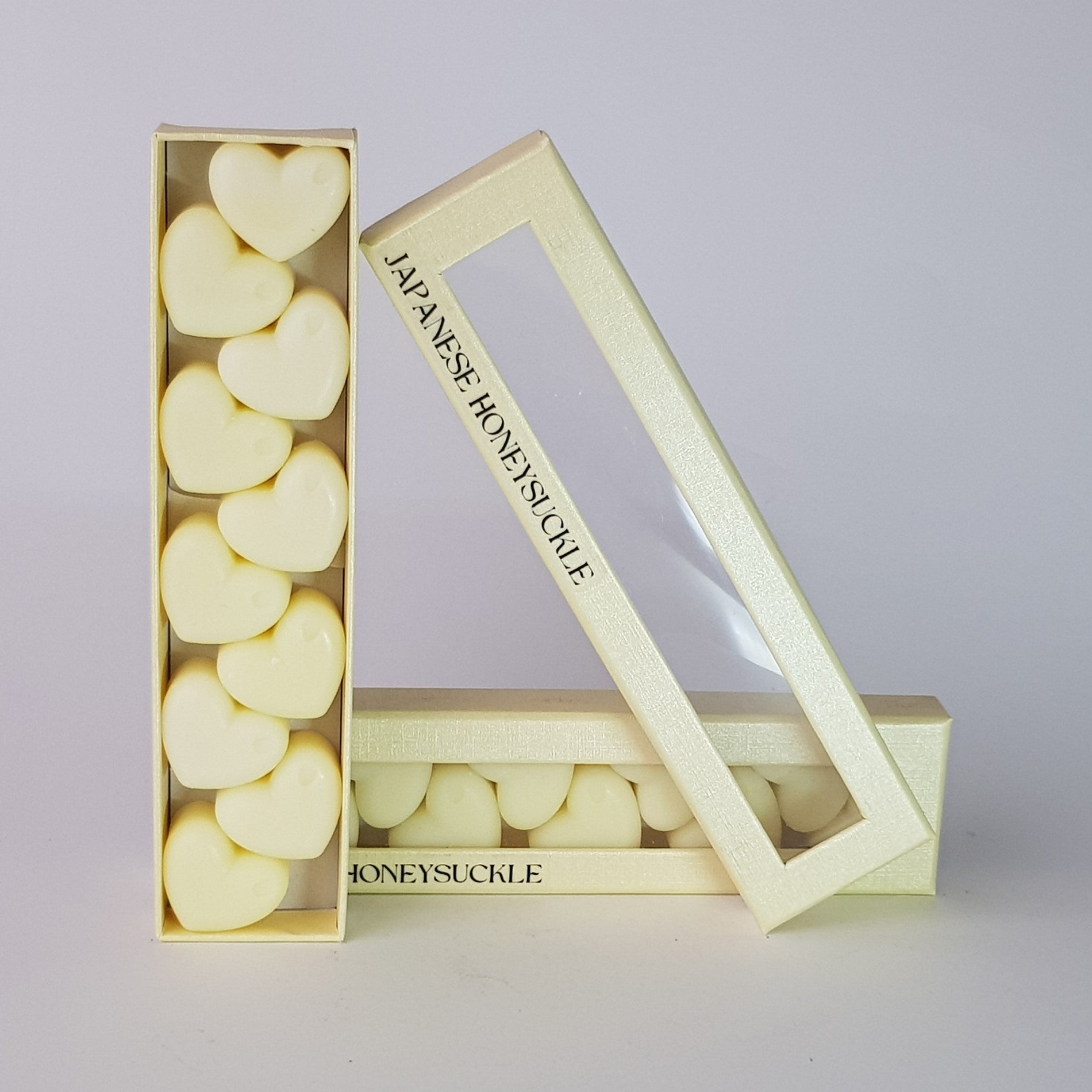 "This is the front view of heart shaped soy wax melts, featuring 10 solid wax melts inside a rectangular box. The fragrance of the wax melt is  "Japanese honeysuckle" and it contains 76 grams of soy wax and it is hand crafted in Melbourne, Australia."