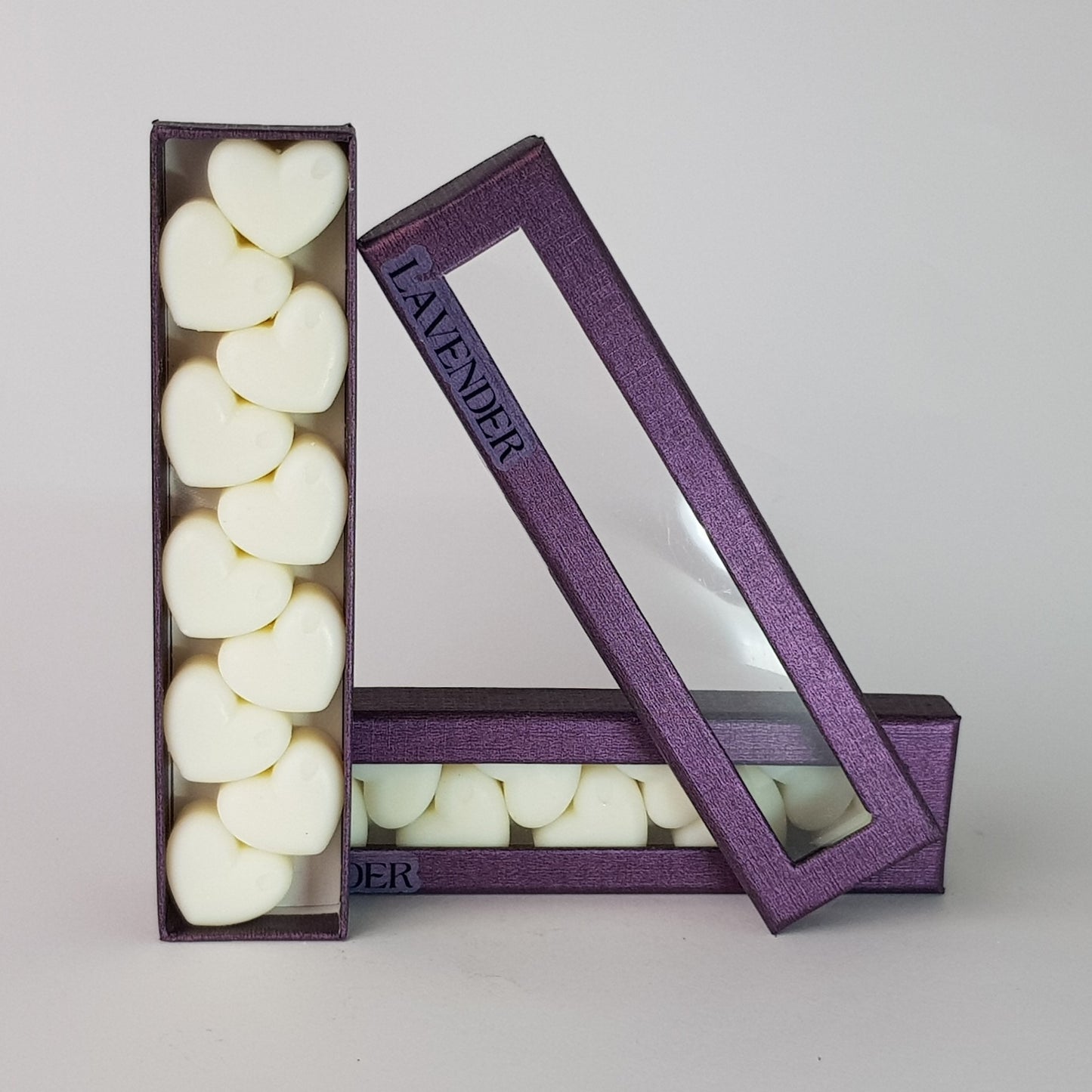 "This is the front view of heart shaped soy wax melts, featuring 10 solid wax melts inside a rectangular box. The fragrance of the wax melt is  "Lavender" and it contains 76 grams of soy wax and it is hand crafted in Melbourne, Australia."
