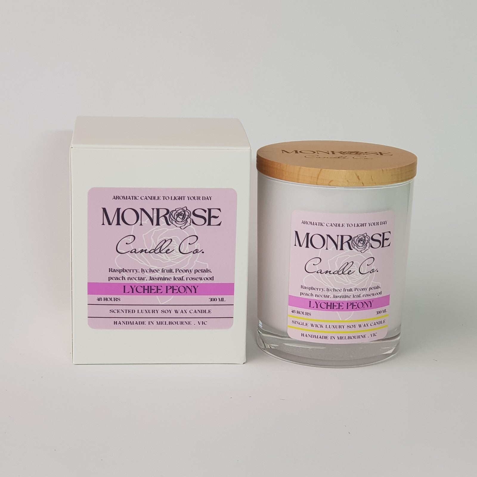 Front view of a white jar candle with "Lychee peony" fragrance and a cotton wick, containing 265 grams of soy wax and offering 48 hours of burn time.