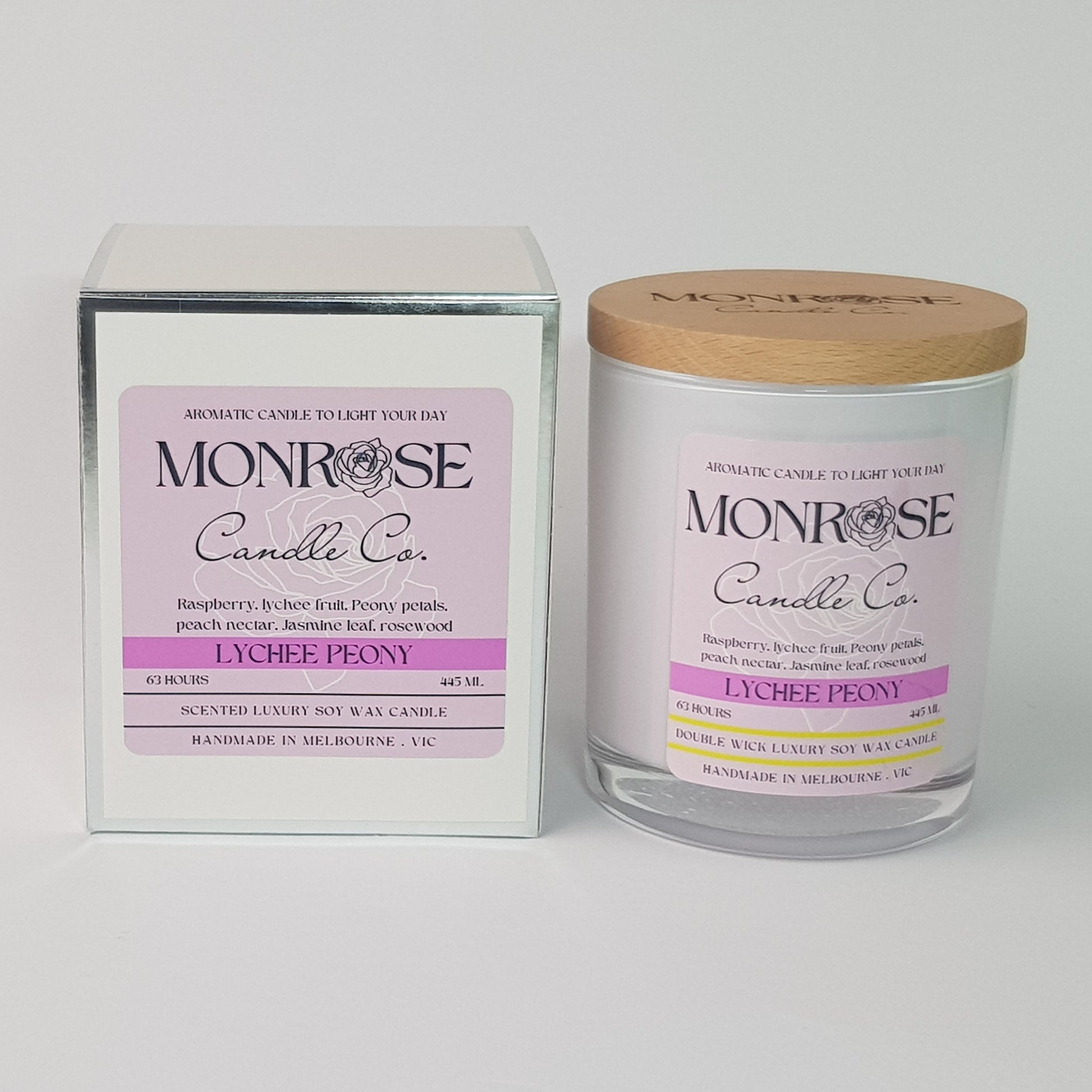 Front view of a white jar candle with "Lychee peony" fragrance and double cotton wicks, containing 395 grams of soy wax and offering 63 hours of burn time.