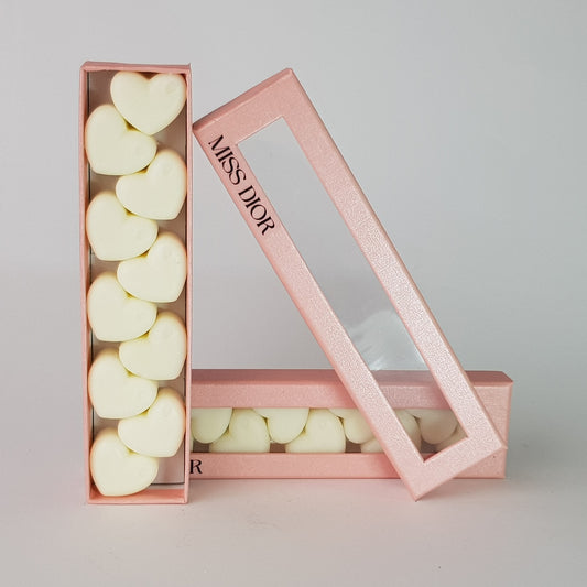 "This is the front view of heart shaped soy wax melts, featuring 10 solid wax melts inside a rectangular box. The fragrance of the wax melt is  "Miss Dior" and it contains 76 grams of soy wax and it is hand crafted in Melbourne, Australia."