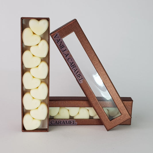 "This is the front view of heart shaped soy wax melts, featuring 10 solid wax melts inside a rectangular box. The fragrance of the wax melt is  "Vanilla caramel" and it contains 76 grams of soy wax and it is hand crafted in Melbourne, Australia."