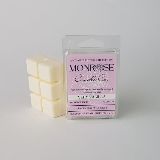 This is the side view of a 6 pack soy wax melt, featuring a blue solid wax melt standing on the left of the packaging. The fragrance of the wax melt is "Very vanilla" and contains 70 grams of soy wax and it is hand crafted in Melbourne, Australia.