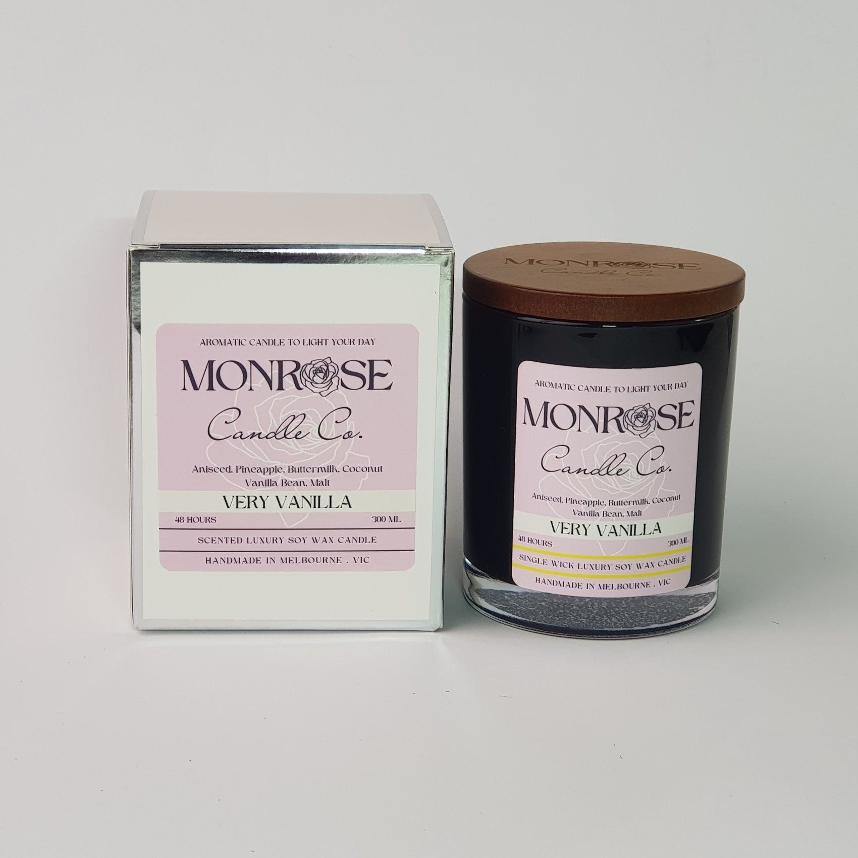 Front view of a black jar candle with the "very vanilla" fragrance and a cotton wick, containing 265 grams of soy wax and offering 48 hours of burn time.